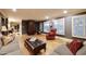 Spacious living room with hardwood floors, comfortable seating, and built-in cabinetry at 5123 E Mcdonald Dr, Paradise Valley, AZ 85253