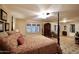 Elegant Primary bedroom with a four-poster bed and hardwood floors at 5123 E Mcdonald Dr, Paradise Valley, AZ 85253