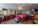 Bedroom with double bed, ceiling fan, and ample storage at 17447 N 99Th Dr, Sun City, AZ 85373