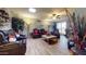 Comfortable living room, leather furniture, hardwood floors at 17447 N 99Th Dr, Sun City, AZ 85373