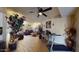 Spacious living room with leather furniture and hardwood floors at 17447 N 99Th Dr, Sun City, AZ 85373