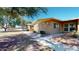 Ranch-style home with walkway and landscaping at 17447 N 99Th Dr, Sun City, AZ 85373