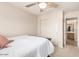 Bedroom with double bed, ceiling fan and access to bathroom at 7959 W Waltann Ln, Peoria, AZ 85382
