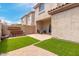 Artificial turf backyard with patio and seating area at 7959 W Waltann Ln, Peoria, AZ 85382