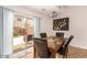 Dining area with table and chairs, access to backyard at 7959 W Waltann Ln, Peoria, AZ 85382