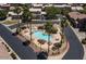 Community pool and spa with surrounding landscaping at 7959 W Waltann Ln, Peoria, AZ 85382
