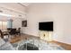 Open concept living and dining area with hardwood floors at 7959 W Waltann Ln, Peoria, AZ 85382