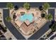 Community pool and spa with lounge chairs at 7959 W Waltann Ln, Peoria, AZ 85382