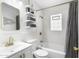 Updated bathroom with white subway tiles, a bathtub, and gold fixtures at 2337 N Dayton St, Phoenix, AZ 85006