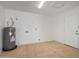 Laundry room with tile flooring and water heater at 15840 N 22Nd St, Phoenix, AZ 85022