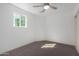 Spacious bedroom with ceiling fan and window at 15840 N 22Nd St, Phoenix, AZ 85022