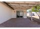 Covered patio with brick pavers and sliding glass door access at 15840 N 22Nd St, Phoenix, AZ 85022