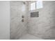 Updated shower with marble tile and modern fixtures at 15840 N 22Nd St, Phoenix, AZ 85022