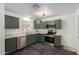 Updated kitchen with stainless steel appliances and green cabinetry at 15840 N 22Nd St, Phoenix, AZ 85022
