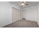 Bedroom with double door closet and carpet flooring at 15840 N 22Nd St, Phoenix, AZ 85022
