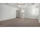 Large bedroom with ceiling fan and access to bathroom at 15840 N 22Nd St, Phoenix, AZ 85022