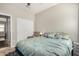Charming bedroom with double doors and built-in storage at 22608 W Gardenia Dr, Buckeye, AZ 85326