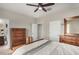 Well-lit bedroom featuring double doors and built-in storage at 22608 W Gardenia Dr, Buckeye, AZ 85326