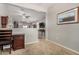 Convenient home office with a desk and view into living area at 22608 W Gardenia Dr, Buckeye, AZ 85326
