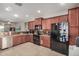 Spacious kitchen with stainless steel appliances and granite countertops at 22608 W Gardenia Dr, Buckeye, AZ 85326