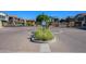 Gated community entrance with paved circular drive and landscaping at 17365 N Cave Creek Rd # 246, Phoenix, AZ 85032