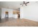 Open concept kitchen and dining with light wood cabinets and breakfast bar at 17365 N Cave Creek Rd # 246, Phoenix, AZ 85032