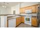 Well-equipped kitchen with light wood cabinets and stainless steel appliances at 17365 N Cave Creek Rd # 246, Phoenix, AZ 85032