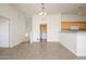 Dining area with tile flooring and adjacent laundry area at 17365 N Cave Creek Rd # 246, Phoenix, AZ 85032