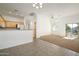 Open kitchen and living area with tile floors and access to a balcony at 17365 N Cave Creek Rd # 246, Phoenix, AZ 85032