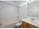 Bathroom with shower/tub, wood vanity, and tiled flooring at 17365 N Cave Creek Rd # 246, Phoenix, AZ 85032