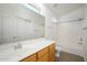 Clean bathroom with tiled shower/tub combo, wood vanity, and mirror at 17365 N Cave Creek Rd # 246, Phoenix, AZ 85032