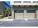 Two-car garage with automatic openers and ample storage space at 17365 N Cave Creek Rd # 246, Phoenix, AZ 85032