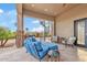 Relaxing patio with spiral staircase and mountain views at 10803 W Dove Roost Rd, Queen Creek, AZ 85144