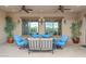 Covered patio with comfortable seating and mountain views at 10803 W Dove Roost Rd, Queen Creek, AZ 85144
