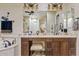 Primary bathroom with double vanity and large mirror at 10803 W Dove Roost Rd, Queen Creek, AZ 85144