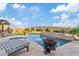 Inviting pool and patio area with mountain backdrop at 10803 W Dove Roost Rd, Queen Creek, AZ 85144