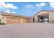 Spacious 3-car garage with workshop at 10803 W Dove Roost Rd, Queen Creek, AZ 85144