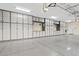 Large garage featuring ample storage and a clean finish at 10803 W Dove Roost Rd, Queen Creek, AZ 85144