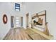 Bright and airy foyer with hardwood floors and modern decor at 3329 W Desert Dawn Dr, Phoenix, AZ 85083