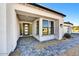 Inviting entryway with covered porch and stylish front door at 3329 W Desert Dawn Dr, Phoenix, AZ 85083