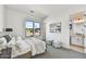 Spacious bedroom with en-suite bathroom and large windows at 3329 W Desert Dawn Dr, Phoenix, AZ 85083