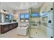 Bathroom with double vanity, walk-in shower and large windows at 3329 W Desert Dawn Dr, Phoenix, AZ 85083