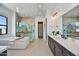 Luxurious bathroom with soaking tub, walk-in shower, and double vanity at 3329 W Desert Dawn Dr, Phoenix, AZ 85083
