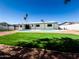 Home with a refreshing pool and grassy backyard at 1737 N Trevor Dr, Mesa, AZ 85201