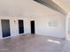 Attached garage with two doors and a window at 1737 N Trevor Dr, Mesa, AZ 85201