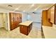 Modern kitchen with a large island and ample wood cabinetry at 1737 N Trevor Dr, Mesa, AZ 85201