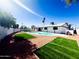 Inviting backyard oasis with a sparkling pool at 1737 N Trevor Dr, Mesa, AZ 85201