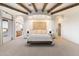 Luxurious main bedroom with an ensuite bathroom and access to a private balcony at 14511 E Windstone Trl, Scottsdale, AZ 85262