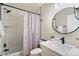 Clean bathroom with single vanity and shower/tub combo at 1413 E Windsor Ave, Phoenix, AZ 85006