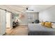 Spacious main bedroom with king-size bed and en-suite bathroom at 1413 E Windsor Ave, Phoenix, AZ 85006